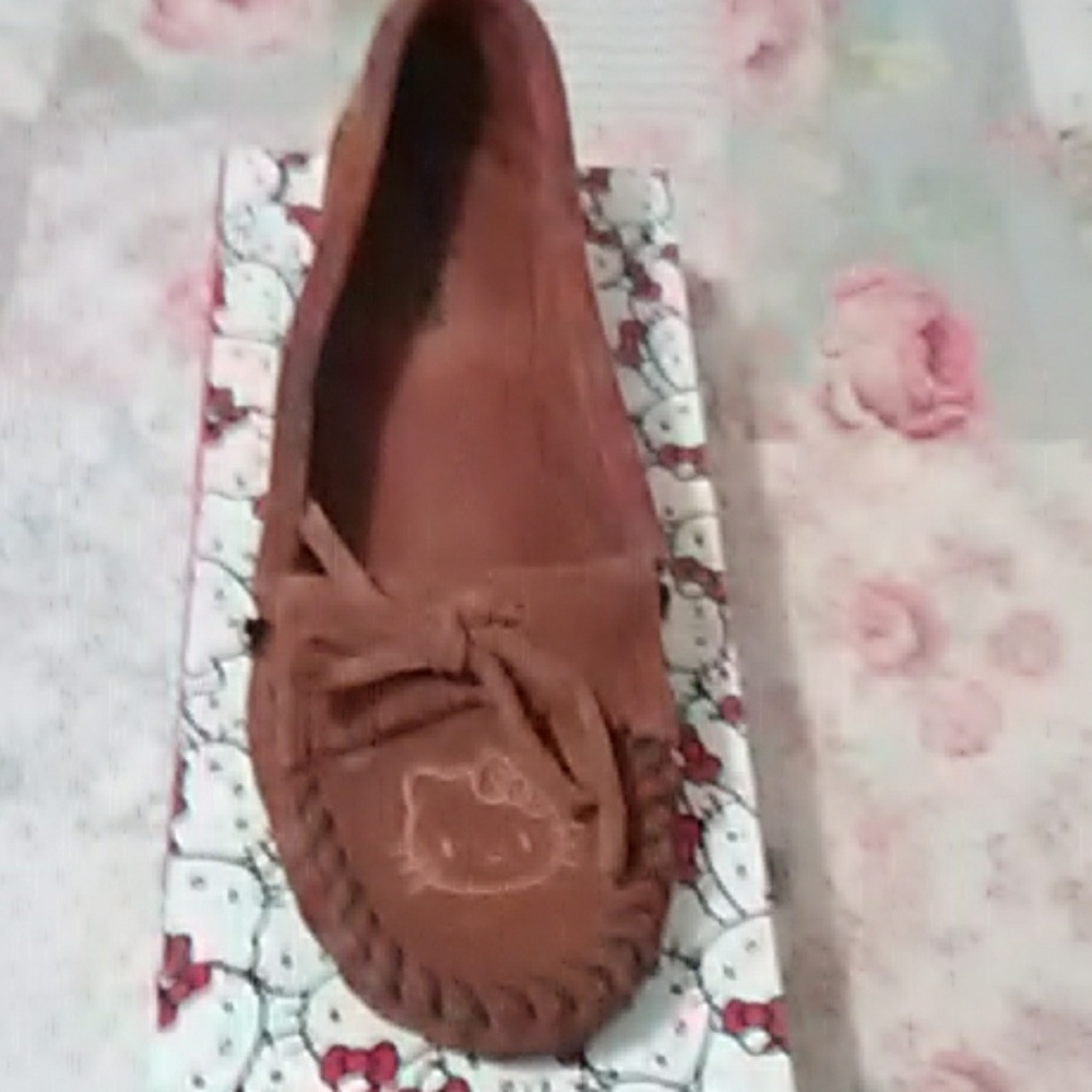 Minnetonka ,hello Kitty moccasins